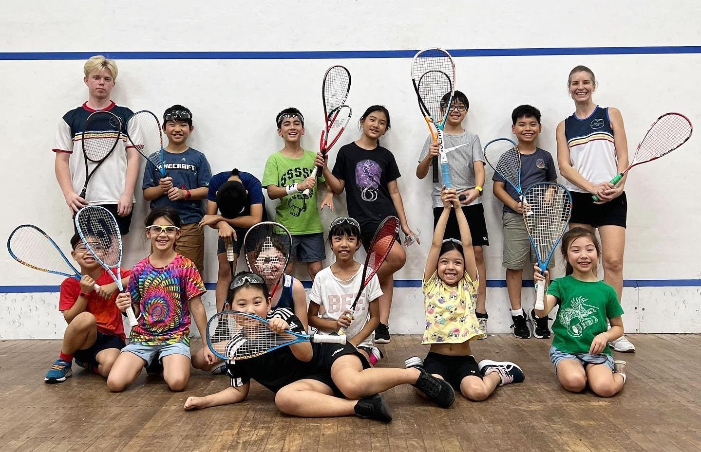 Happy kids in the group Beginner & Junior Squash