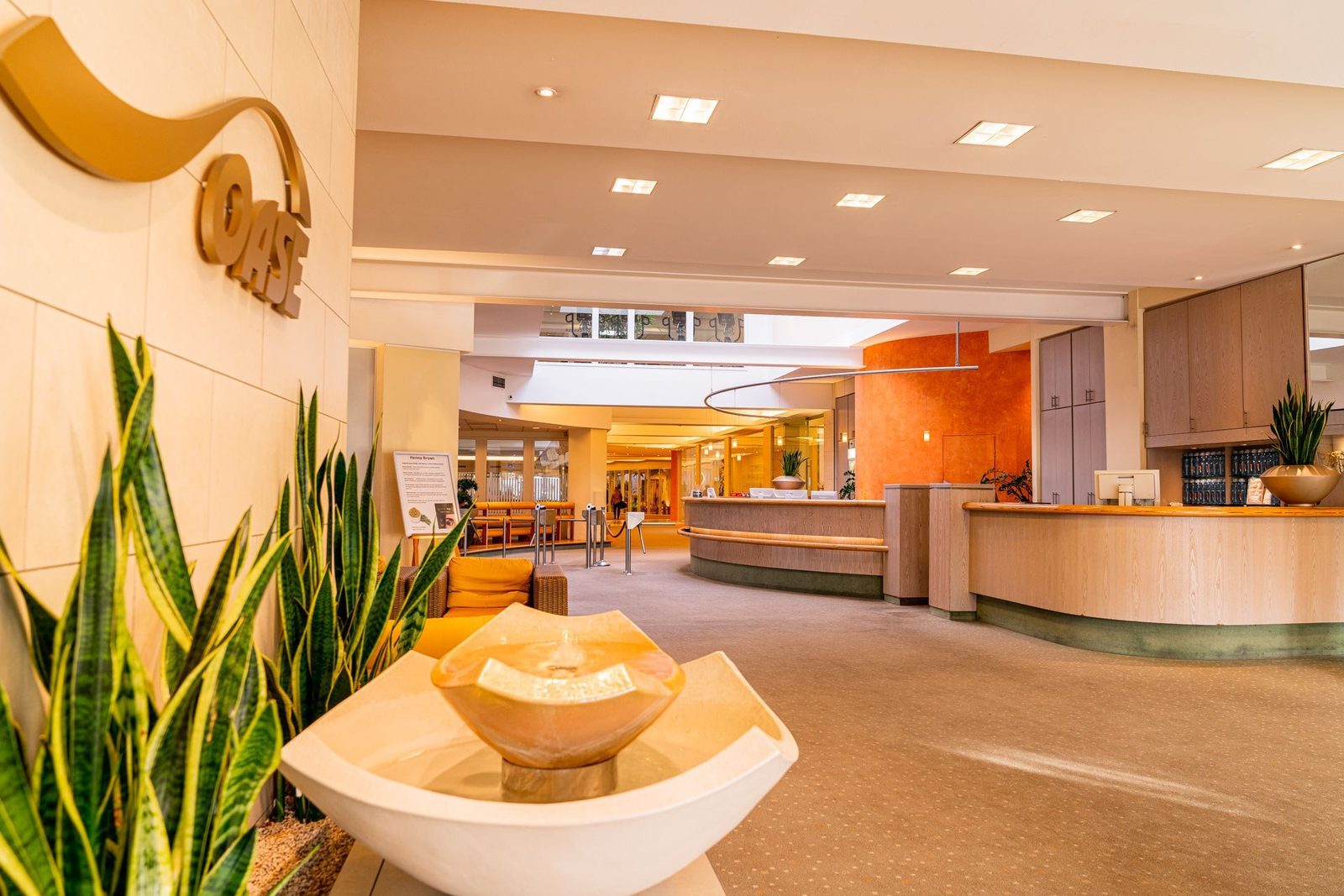 The photo shows the appealing ambiance of the reception area at Fit-Well Bochum