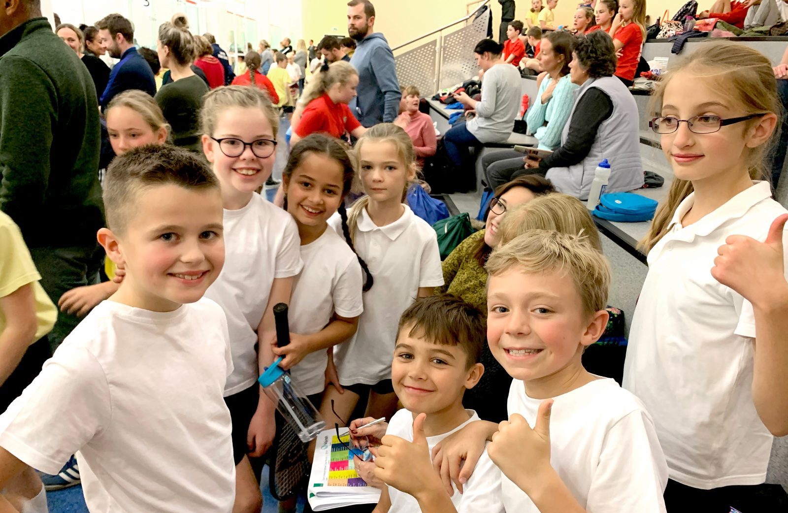 How to make school kids into smiling squash players!