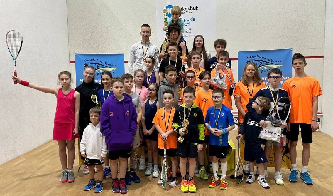 Building squash courts and developing juniors... in the midst of war