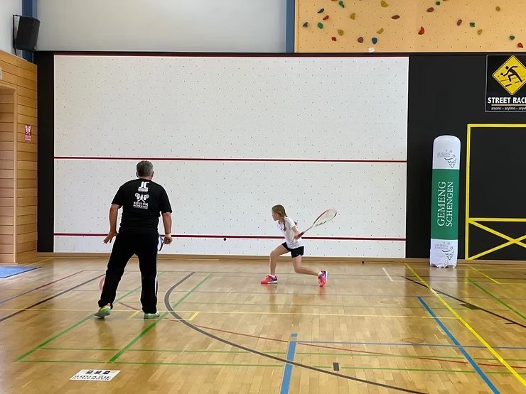 One-Wall-Squash in a school gymnasium