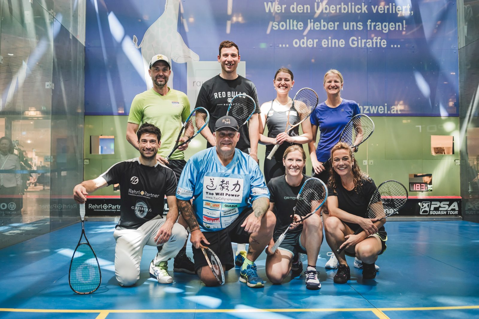 Sports Stars on Court – Celebrity Squash Match at the Austrian Squash Challenge in Europark Salzburg - Front row (left to right): Aqeel Rehman, Franz Müllner – “The Austrian Rock,” multiple world record holder in extreme strength feats, Andrea Fischbacher – Olympic Champion in Super-G (2010), World Championship bronze medalist (2009), three World Cup victories, runner-up in the 2008/09 Downhill World Cup overall standings, Manuela Stöckl – Professional dancer and winner of Dancing Stars (2007). Back row (left to right): Andreas Prommegger – Snowboard World Champion (parallel events), multiple overall World Cup winner, Peter Hochkofler – Italian national team ice hockey player and professional for HC Bolzano, Lilli Brugger – European Championship medalist in air rifle shooting, Andrea Zarfl – Multiple-time Austrian judo champion and national team athlete.